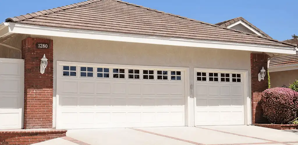 Residential garage door repair service for a double garage door in Henderson, NV