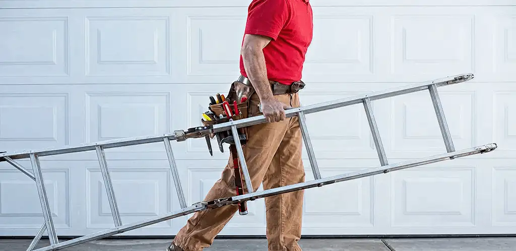 Garage door repair technician arriving with tools and ladder in Henderson, NV